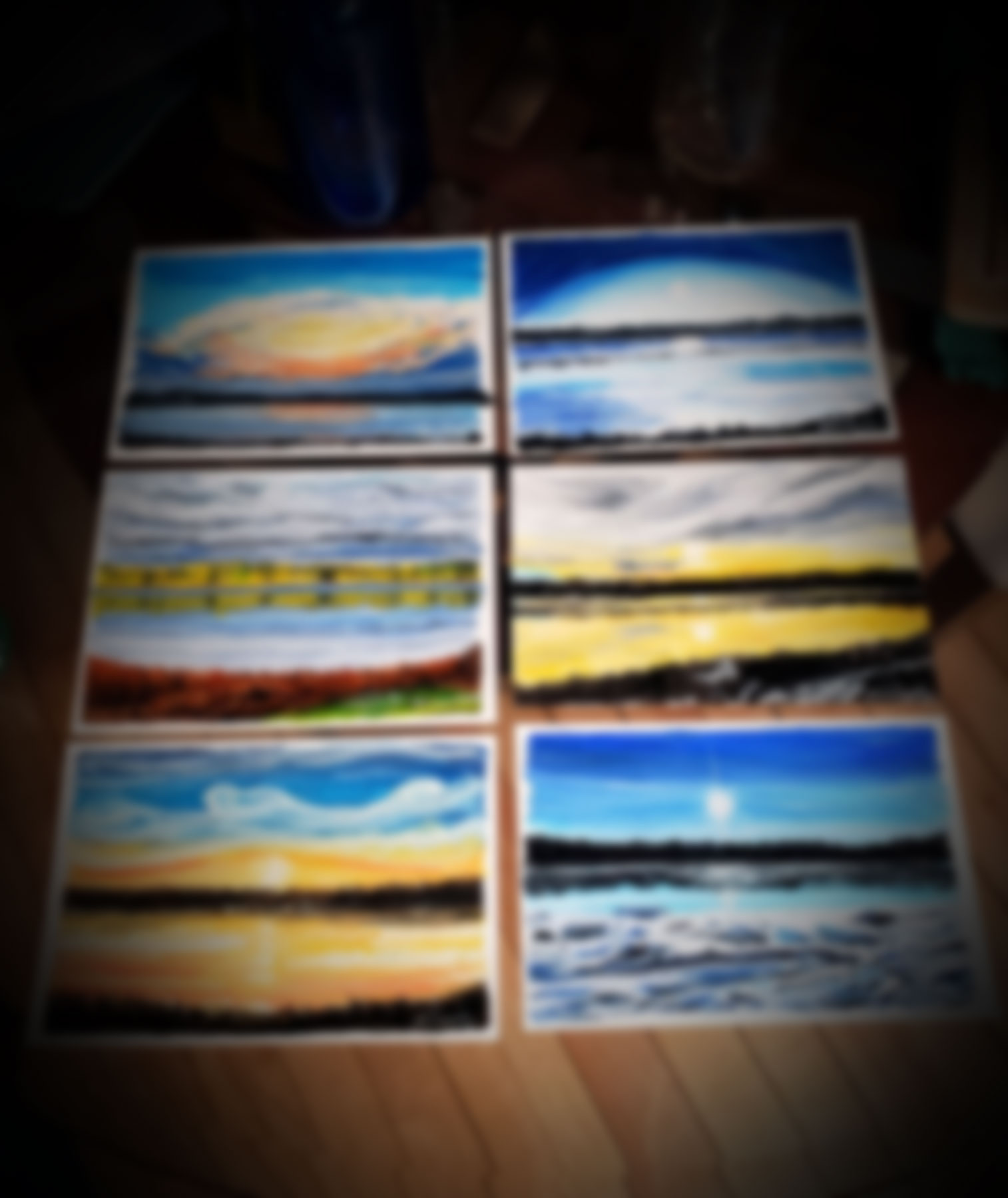 All six original oil paintings laid out together